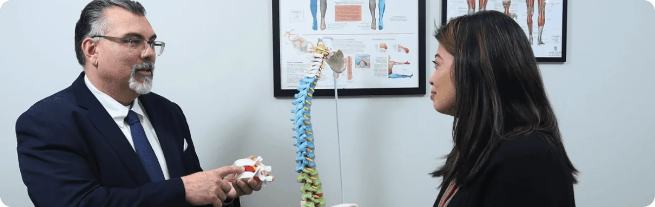 Dr. Apazidis meeting with a patient in the office